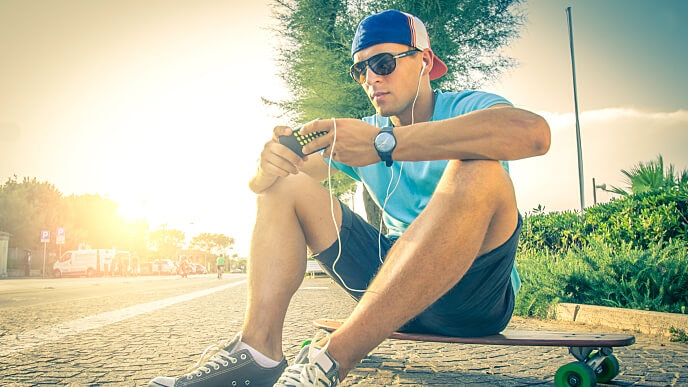 stock-photo-man-on-longboard-at-sunset