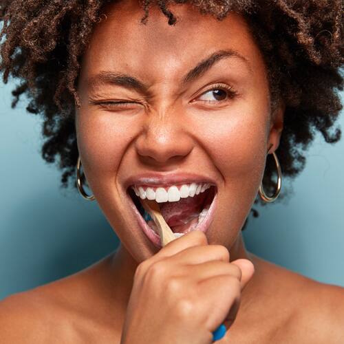 Woman with toothbrush